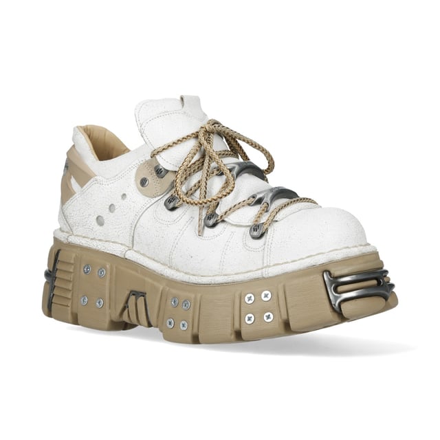 Los zapatos New Rock M-120N-C80 de la Colección Metallic combinan la estética gótica y punk con un toque futurista. Fabricados en material sintético de alta calidad con interior de piel de cerdo, ofrecen durabilidad y comodidad. Con un llamativo tacón de plataforma de 7 cm y una suela de 4 cm, estos zapatos ofrecen un look sofisticado y llamativo. El diseño con cordones refuerza su carácter rebelde, haciéndolos perfectos para quienes adoptan la moda alternativa con un toque moderno. Características principales: Material: Exterior - Sintético | Interior - Piel de cerdo | Altura del tacón: 7 cm | Altura de la plataforma: 4 cm | Material de la suela: PU-ULTRA | Cierre: Cordones (cordón) | Altura de la caña: 10 cm | Estilo: Gótico, Heavy, Punk, Rock | Diseño unisex: Adecuados tanto para hombre como para mujer | Color único: Exterior blanco llamativo con suela beige para un look impactante
