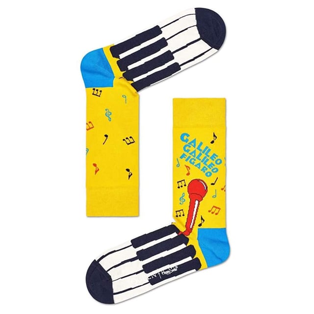 Happy Socks Queen Socks: Happy Socks are a popular brand providing a high-quality sock that combines unique designs and craftsmanship. Mikael Söderlindh and Viktor Tell had a vision to spread happiness by turning an everyday essential into a colorful design piece. In 2008, socks were just socks. White, grey and black pieces of textile that were nowhere close to the fashionable and creative design piece they could become. The world’s most comfortable and colorful tool for spreading happiness was born. This concept is now brought to life by Happy Socks’ talented team of creatives. Today, Happy Socks has reached 90 countries and every continent. With Concept Stores all around the world, from LA to Tokyo, Happy Socks can be found in over 10,000 top fashion apparel boutiques. These socks are made from a soft, high quality combed cotton rich blend and in a fine gauge knit for versatile wear. Finished with a comfortable smooth toe seam, these socks feature standard cuffs, and are officially licensed limited edition socks. They come in a pack of 1 pair. They are machine washable at 40. They are made from 86% Cotton 12% Polyamide 2% Elastane. Extra Product Details: - Queen Socks by Happy Socks - Bohemian Rhapsody - We Will Rock You - Radio Ga Ga Socks - Colour Block Design - Unique and Funky Patterns - 1 Pair Pack - Machine washable at 40 - 86% Cotton 12% Polyamide 2% Elastane.