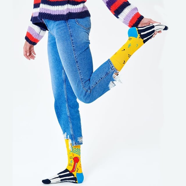 Happy Socks Queen Socks: Happy Socks are a popular brand providing a high-quality sock that combines unique designs and craftsmanship. Mikael Söderlindh and Viktor Tell had a vision to spread happiness by turning an everyday essential into a colorful design piece. In 2008, socks were just socks. White, grey and black pieces of textile that were nowhere close to the fashionable and creative design piece they could become. The world’s most comfortable and colorful tool for spreading happiness was born. This concept is now brought to life by Happy Socks’ talented team of creatives. Today, Happy Socks has reached 90 countries and every continent. With Concept Stores all around the world, from LA to Tokyo, Happy Socks can be found in over 10,000 top fashion apparel boutiques. These socks are made from a soft, high quality combed cotton rich blend and in a fine gauge knit for versatile wear. Finished with a comfortable smooth toe seam, these socks feature standard cuffs, and are officially licensed limited edition socks. They come in a pack of 1 pair. They are machine washable at 40. They are made from 86% Cotton 12% Polyamide 2% Elastane. Extra Product Details: - Queen Socks by Happy Socks - Bohemian Rhapsody - We Will Rock You - Radio Ga Ga Socks - Colour Block Design - Unique and Funky Patterns - 1 Pair Pack - Machine washable at 40 - 86% Cotton 12% Polyamide 2% Elastane.