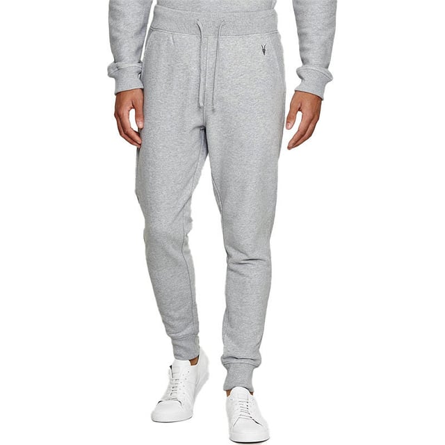 ALL SAINTS Raven Mens Slim Fit Sweatpants 
Made in India
Material: 100% Cotton
Made from super-soft cotton fabric 
Features the signature Ramskull logo to the hip in tonal stitching
Flexible waist with Adjustable Drawstring
Two slip pockets at the hips
Single slip pocket to the back 
Dropped crotch design 
Designed with a slim, tapered fit through the legs
Slim Fit
Bottom of the legs finished with elastic ties
Ribbed Waistband and Cuffs
Fleece Inside
Machine wash at 30ºC