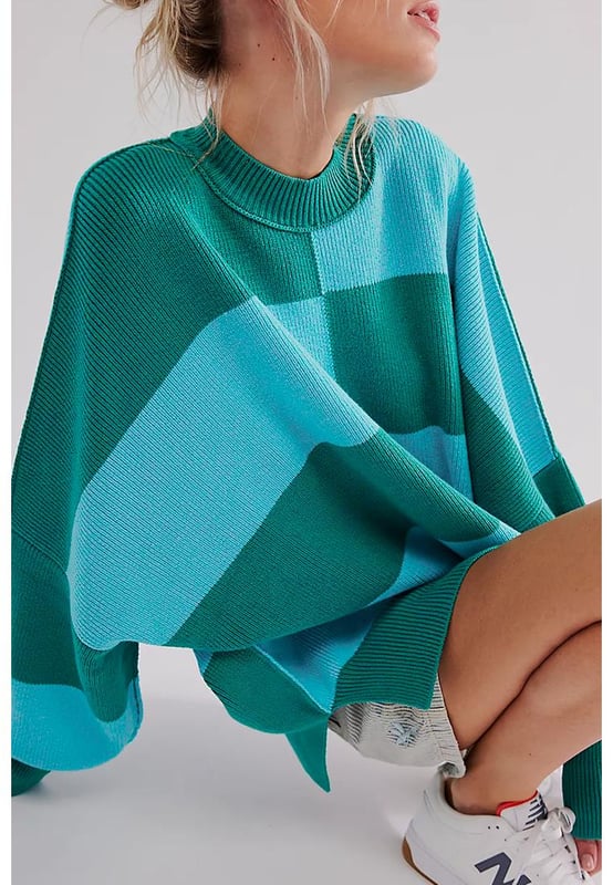 Suéter oversized de hombros caídos con laterales abiertos y patrón a cuadros verde  
  Diseño a cuadros bicolor  
  Estilo dinámico con laterales abiertos  
  Estilo acogedor y casual con hombros caídos  
  Diseño versátil que combina bien con cualquier atuendo  
  Consulta la tabla de tallas para el ajuste perfecto  
Material: 50% Viscosa 28% Poliéster 22% Poliamida