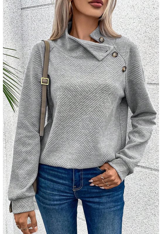 Gray high neck sweatshirt
  Asymmetric button detailing on the front
  Textured fabric with a soft feel
  Versatile for casual and formal occasions
Material: 95% Polyester 5% Elastane