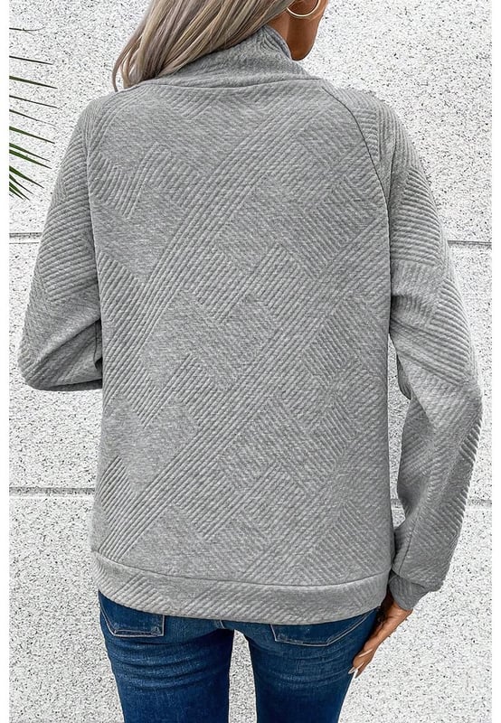 Gray high neck sweatshirt
  Asymmetric button detailing on the front
  Textured fabric with a soft feel
  Versatile for casual and formal occasions
Material: 95% Polyester 5% Elastane