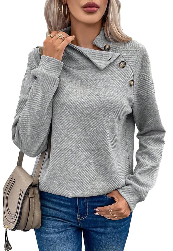 Gray high neck sweatshirt
  Asymmetric button detailing on the front
  Textured fabric with a soft feel
  Versatile for casual and formal occasions
Material: 95% Polyester 5% Elastane