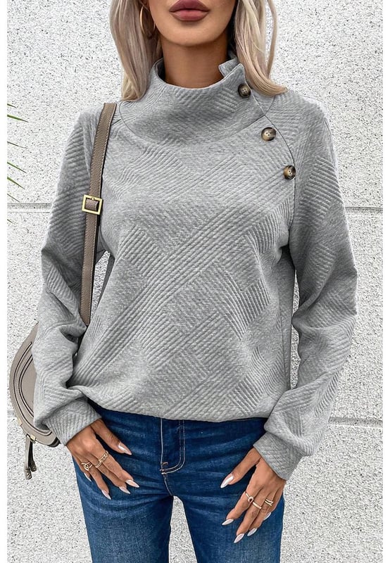 Gray high neck sweatshirt
  Asymmetric button detailing on the front
  Textured fabric with a soft feel
  Versatile for casual and formal occasions
Material: 95% Polyester 5% Elastane