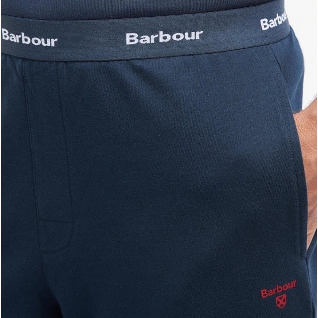 Barbour Barbour JAKE Mens Lounge Joggers Navy

 Upper Material: 100% Cotton

Closure/Fastening: Pull-On

Features: Comfort,Lightweight

Toe Shape: Round

Item Weight: 0.5 KG

Clothing Fit: Regular

Heel Height: None

Single Or Multi Pack?: Single

Gift Boxed: No

Material Composition: 100% Cotton

Clothing Features: Elasticated Waistband on Trousers with Barbour Logo | Two Side Seam Pockets | Rib Detailed Bottom Cuffs
Product Code: MNW0022NY91