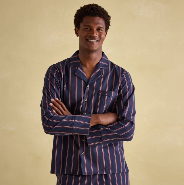 Joules Joules HUGO Mens Pyjama Set Navy Stripe

Closure/Fastening: Button,Pull-On

Features: Comfort

Item Weight: 0.4 KG

Clothing Fit: Regular

Single Or Multi Pack?: Single

Gift Boxed: No

Material Composition: 100% Cotton

Clothing Features: Single Chest Pocket | Piped Trims | Elasticated Waist | Drawstring Ties | Branded Tab on Waistband
Product Code: 372828-NVYSTRP