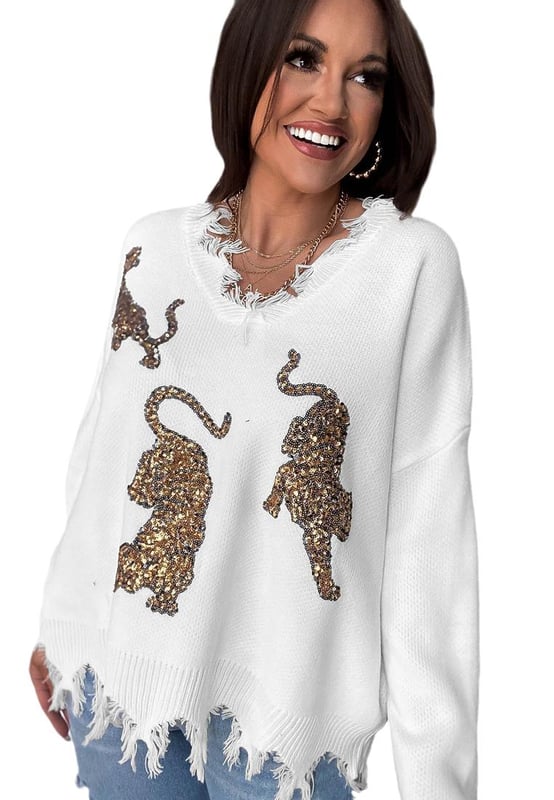 Luxurious White Frayed Sequin Tiger Sweater
  Features a frayed hemline and sequin tiger motif
  High
  quality materials ensure comfort and durability
  Perfect for making a statement and everyday wear