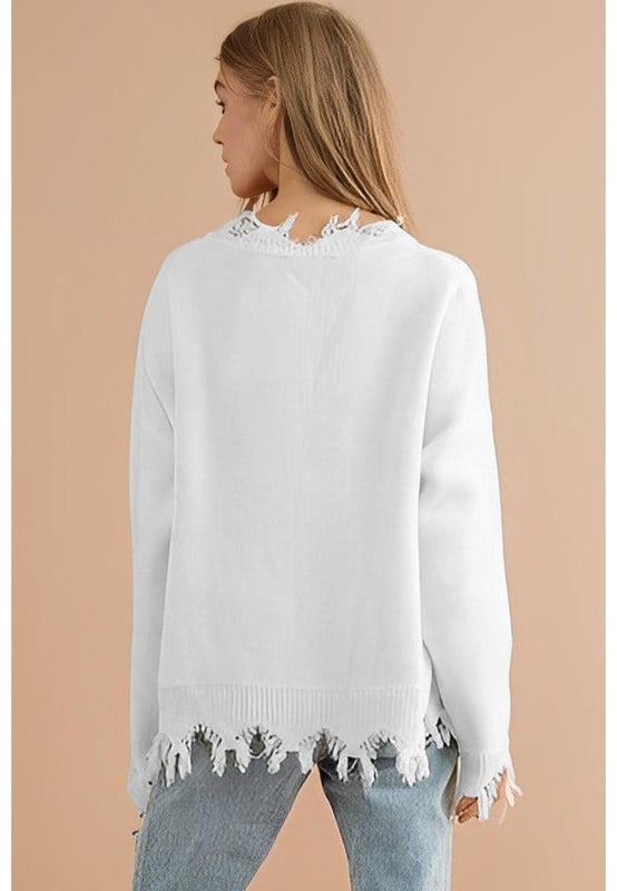 Luxurious White Frayed Sequin Tiger Sweater
  Features a frayed hemline and sequin tiger motif
  High
  quality materials ensure comfort and durability
  Perfect for making a statement and everyday wear
