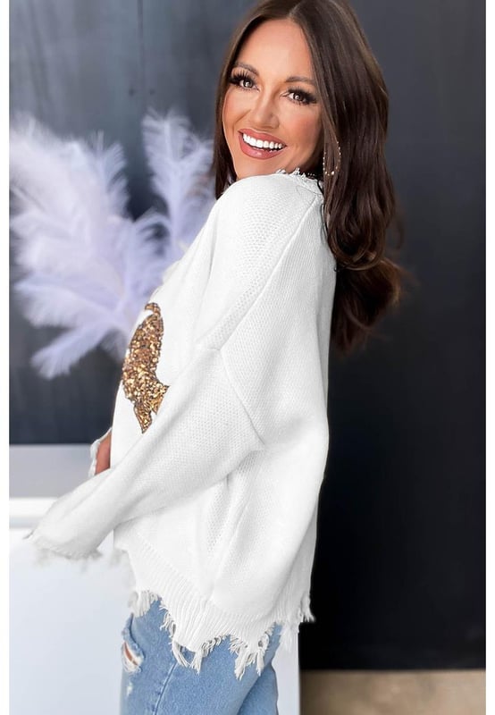 Luxurious White Frayed Sequin Tiger Sweater
  Features a frayed hemline and sequin tiger motif
  High
  quality materials ensure comfort and durability
  Perfect for making a statement and everyday wear