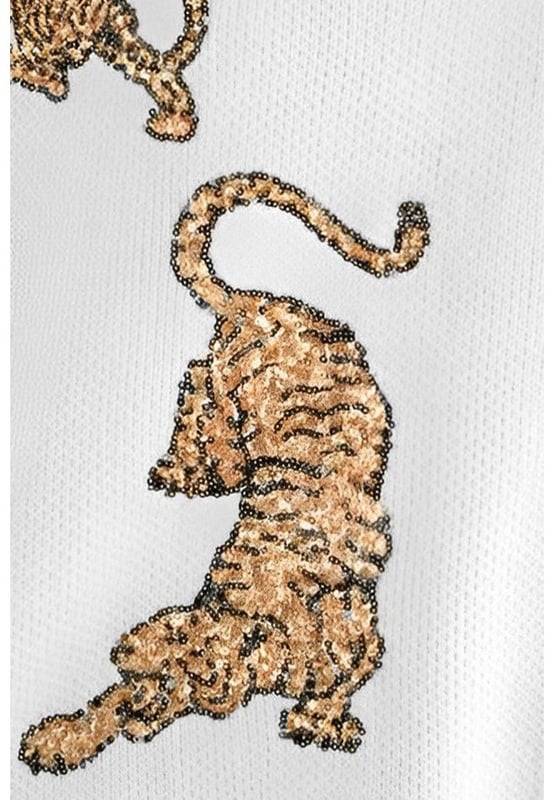 Luxurious White Frayed Sequin Tiger Sweater
  Features a frayed hemline and sequin tiger motif
  High
  quality materials ensure comfort and durability
  Perfect for making a statement and everyday wear
