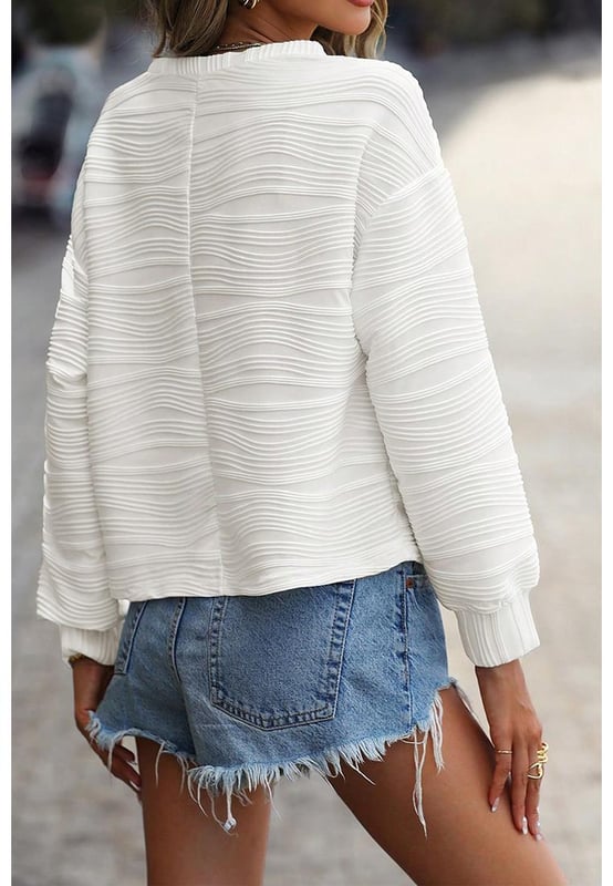 Unique wavy texture design
  Relaxed fit with drop shoulder and round neck
  Versatile and easy to pair with any bottoms
  Classic style that never goes out of fashion
  Available in different sizes with high elasticity for comfortable fit
Material: 90% Polyester 10% Elastane