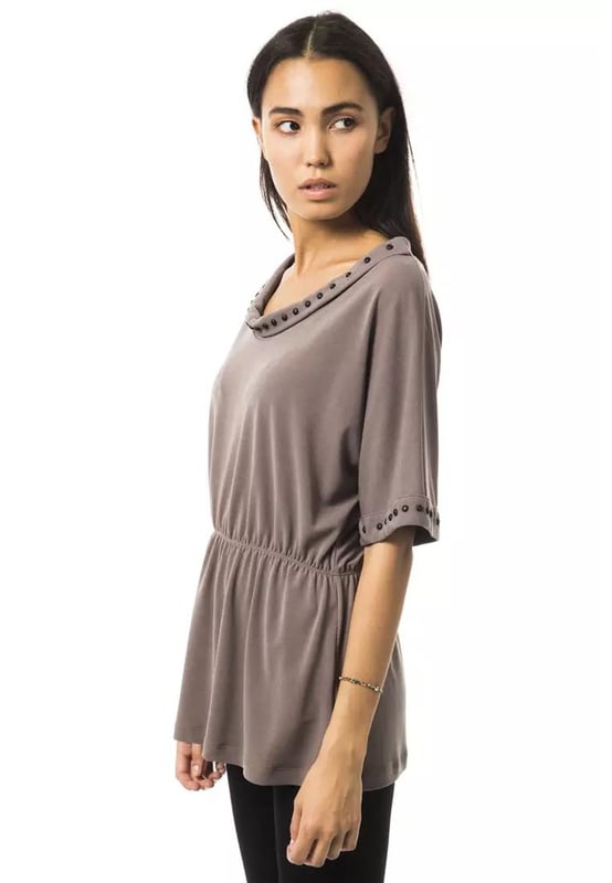 Gray Polyester Tops & T
  Shirt
  Open round neck design
  3/4 sleeves
  Made from high
  quality polyester
  Comfortable and breathable fit
  Versatile addition to your wardrobe
  Suitable for casual occasions
  Perfect for pairing with jeans or skirts
  Available for women
Material: 94% Polyester 6% Elastane