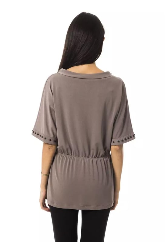 Gray Polyester Tops & T
  Shirt
  Open round neck design
  3/4 sleeves
  Made from high
  quality polyester
  Comfortable and breathable fit
  Versatile addition to your wardrobe
  Suitable for casual occasions
  Perfect for pairing with jeans or skirts
  Available for women
Material: 94% Polyester 6% Elastane
