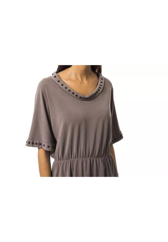 Gray Polyester Tops & T
  Shirt
  Open round neck design
  3/4 sleeves
  Made from high
  quality polyester
  Comfortable and breathable fit
  Versatile addition to your wardrobe
  Suitable for casual occasions
  Perfect for pairing with jeans or skirts
  Available for women
Material: 94% Polyester 6% Elastane