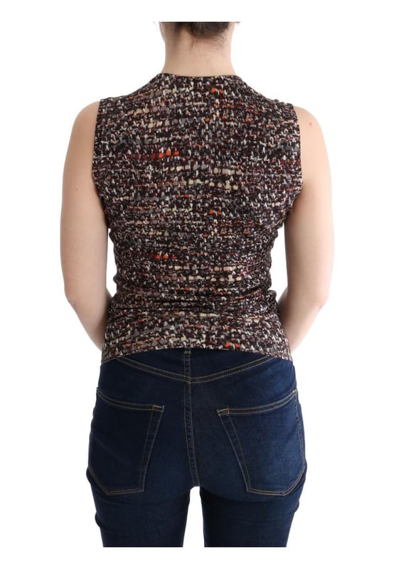Nuevo con etiquetas  
Diseño sin mangas  
Hecho en Italia  
Confeccionado en 100% lana virgen  
Tejido multicolor  
Detalles del logo  
Perfecto para mujeres que aprecian la moda de alta calidad  
Material: 100% lana virgen