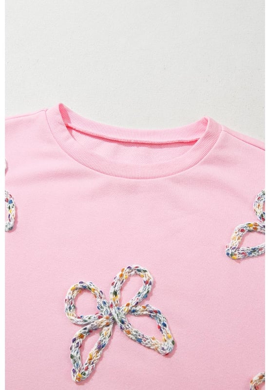 Fashionable pullover sweatshirt for casual wear
  Light pink color with embroidered bows for a feminine flair
  Lantern sleeves and oversized fit for a voluminous look
  Can be paired with jeans or denim shorts
  Ideal for everyday wear
Material: 65% Polyester 35% Cotton