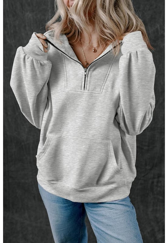 Casual sweatshirt in solid light grey color
  Zip
  up stand neck for a modern and comfortable fit
  Deep side
  entry kangaroo pockets for secure storage and hand warmth
  Textured and durable fabric for quality and comfort
  Focus on comfort and functionality
Material: 50% Polyester 50% Cotton