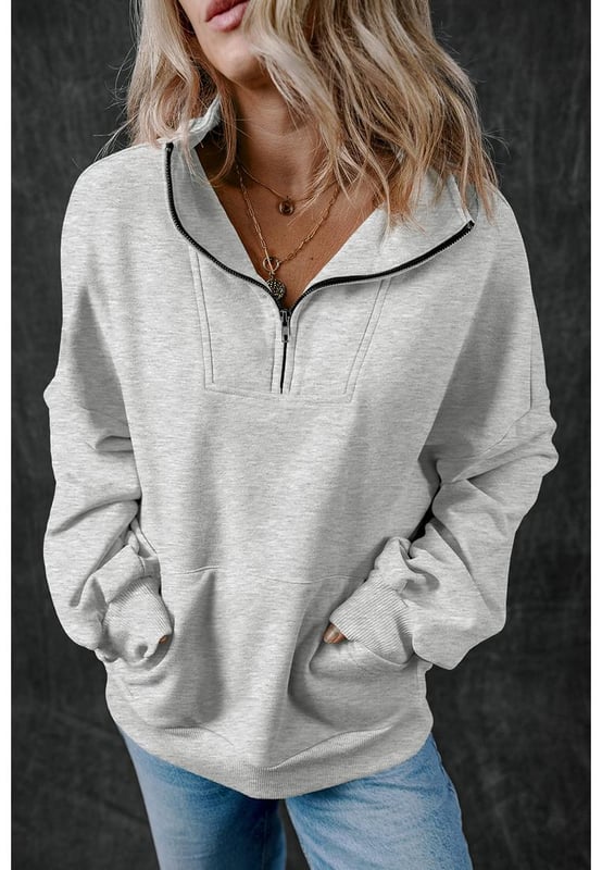 Casual sweatshirt in solid light grey color
  Zip
  up stand neck for a modern and comfortable fit
  Deep side
  entry kangaroo pockets for secure storage and hand warmth
  Textured and durable fabric for quality and comfort
  Focus on comfort and functionality
Material: 50% Polyester 50% Cotton