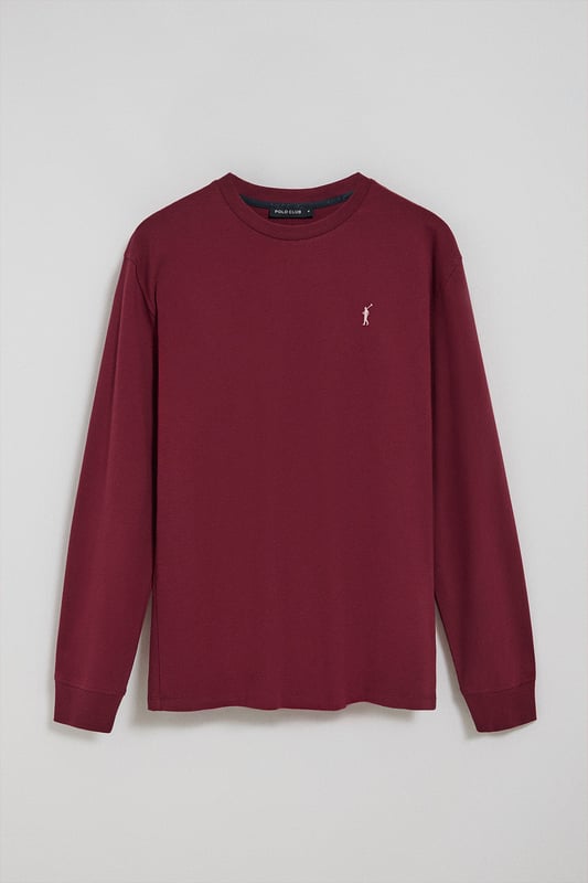 Entdecken Sie die perfekte Kombination aus Schlichtheit und Stil mit unserem klassischen Langarm-T-Shirt für Herren. Es ist aus weicher Baumwolle gefertigt und bietet den Komfort, den Sie sich von einem Essential wünschen. Der gerippte Rundhalsausschnitt sorgt für eine bequeme Passform. Das mit Logo versehene Nahtband der Krageninnenseite unterstreicht das Finish. Die unverwechselbare Rigby Go-Stickerei in Kontrastfarbe auf der Brust ist das i-Tüpfelchen, das dieses Poloshirt zu einem Must-Have in Ihrer Garderobe macht.