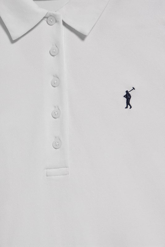 Langärmliges Damen-Poloshirt im Slim Fit aus Baumwollpiqué und Elasthan. Unser Poloshirt Pryanka hat eine frontale Knopfleiste mit fünf Perlmuttknöpfen, die farblich auf das Shirt abgestimmt sind. Kragen und Ärmelbündchen aus Baumwollpiqué für einen femininen, modernen Look. Kleine Öffnungen an den Enden der seitlichen Nähte. Rigby Go Stickerei auf der Brust und personalisierte Nahtbänder.