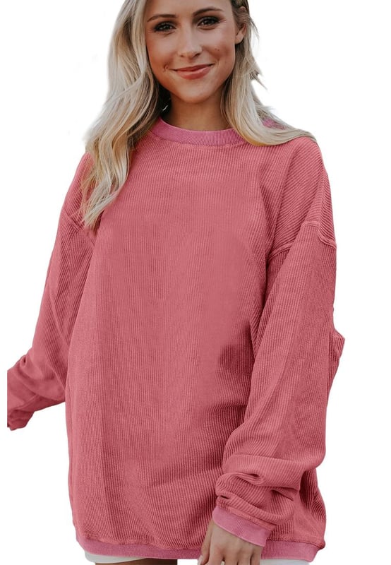 Aardbeienroze Geribbelde Katoenen Oversized Sweatshirt  
Gemaakt van hoogwaardige materialen  
Geribbelde corded ontwerp  
Oversized pasvorm  
Geschikt voor zowel mannen als vrouwen  
Veelzijdig en eenvoudig te stylen  
Perfect om te loungen of uit te gaan met vrienden