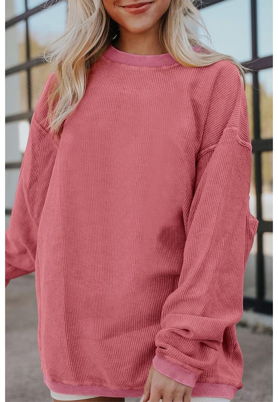 Aardbeienroze Geribbelde Katoenen Oversized Sweatshirt  
Gemaakt van hoogwaardige materialen  
Geribbelde corded ontwerp  
Oversized pasvorm  
Geschikt voor zowel mannen als vrouwen  
Veelzijdig en eenvoudig te stylen  
Perfect om te loungen of uit te gaan met vrienden