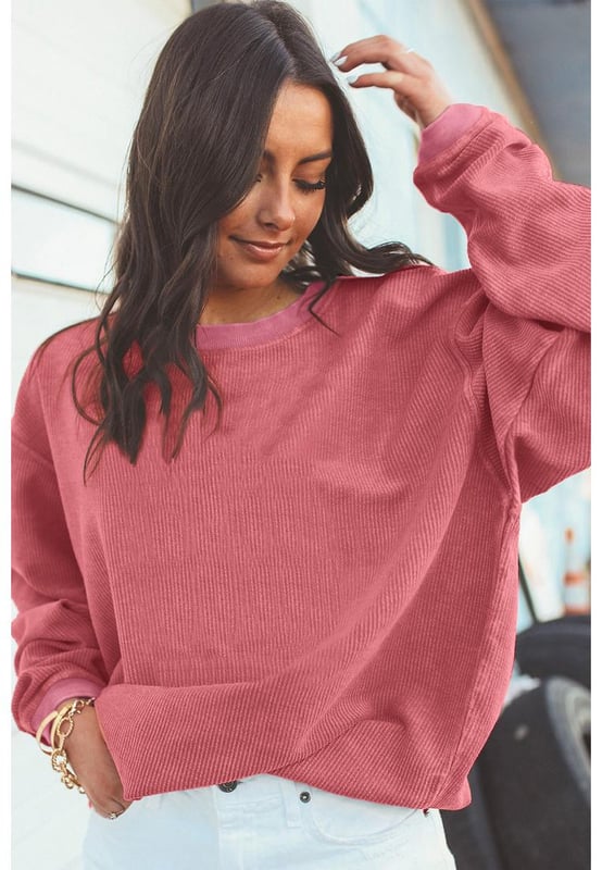 Aardbeienroze Geribbelde Katoenen Oversized Sweatshirt  
Gemaakt van hoogwaardige materialen  
Geribbelde corded ontwerp  
Oversized pasvorm  
Geschikt voor zowel mannen als vrouwen  
Veelzijdig en eenvoudig te stylen  
Perfect om te loungen of uit te gaan met vrienden