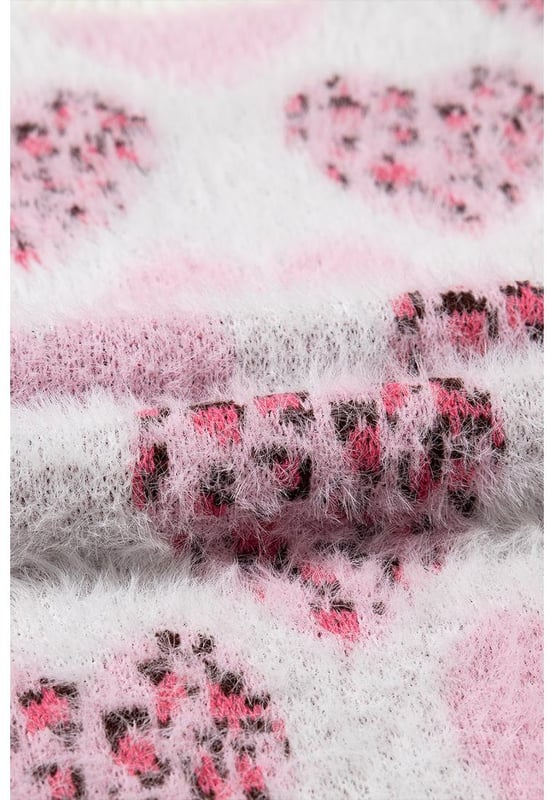 Corazón romántico con forma de corazón y estampado de leopardo  
Detalles perlados para un brillo adicional  
Diseño con ribetes para mayor estructura  
Material suave y acogedor para calidez  
Alta elasticidad