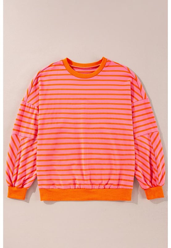 Sudadera a rayas para un estilo casual y chic.  
Diseño relajado con hombros caídos para un look moderno y desenfadado.  
Tejido suave y acogedor con cuello redondo clásico.  
Corte holgado para una silueta casual y relajada.  
Se combina fácilmente con tus pantalones favoritos.  
Material: 70% Poliéster, 25% Algodón, 5% Elastano.