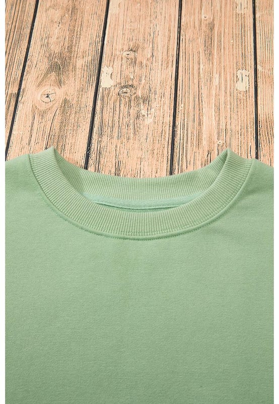 Smoke Green Solid Fleece Lined Drop Shoulder Terry Sweatshirt
  Simple yet stylish design for versatile wear
  Fleece
  lined for warmth in cold winter
  Drop shoulder design for a modern touch
  Long sleeves for comfort and warmth
  Available in sizes S to 2XL
  Comes with a size chart for your convenience
Material: 50% Polyester 50% Cotton