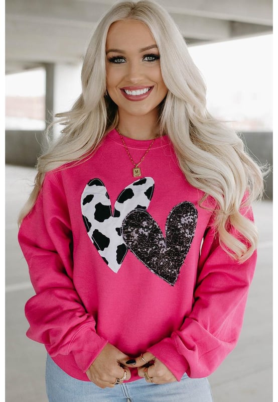 Trendy and eye
  catching design
  Cow & sequin double heart patch on the front
  Soft and cozy feel
  Perfect for lounging or running errands
  Versatile design can be easily mixed and matched
  Available in various chic styles and sizes
  Size chart in CM and INCH provided
Material: 62.7% Polyester 37.3% Cotton