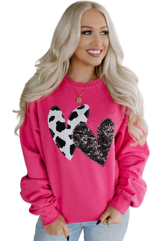 Trendy and eye
  catching design
  Cow & sequin double heart patch on the front
  Soft and cozy feel
  Perfect for lounging or running errands
  Versatile design can be easily mixed and matched
  Available in various chic styles and sizes
  Size chart in CM and INCH provided
Material: 62.7% Polyester 37.3% Cotton