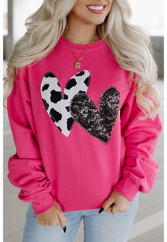 Trendy and eye
  catching design
  Cow & sequin double heart patch on the front
  Soft and cozy feel
  Perfect for lounging or running errands
  Versatile design can be easily mixed and matched
  Available in various chic styles and sizes
  Size chart in CM and INCH provided
Material: 62.7% Polyester 37.3% Cotton