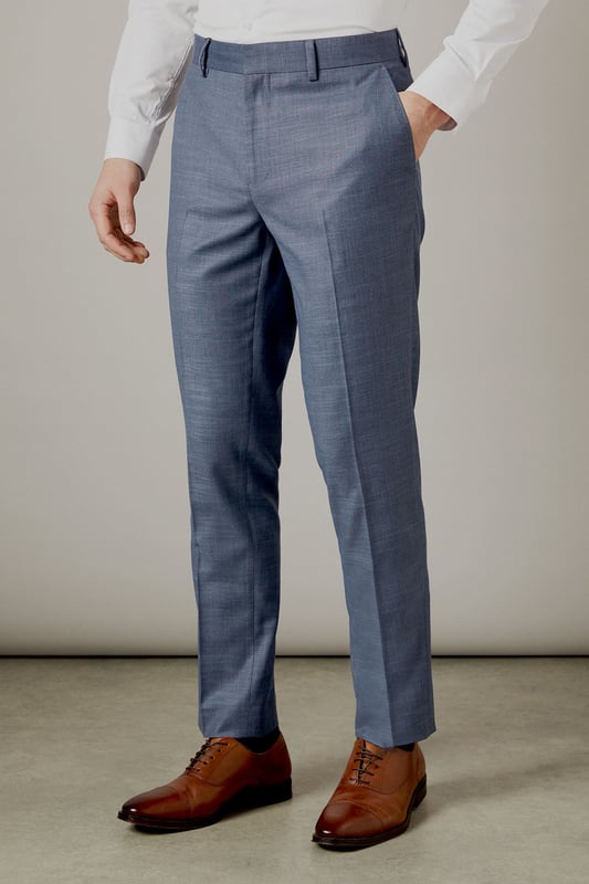 Slim fit design for a modern, tailored silhouette
        Versatile semi-plain fabric suitable for various occasions
        Belt loops for optional accessorising
        Crisp centre crease for a polished look
        Tapered leg ending just above the shoe
    
    These Burton slim fit trousers offer a contemporary twist on classic tailoring, perfect for the discerning gent who appreciates both style and comfort. The semi-plain fabric adds subtle texture, making these trousers a versatile choice for smart-casual events or more formal occasions. Pair them with a crisp white shirt and matching jacket for a sophisticated office ensemble, or dress them down with a polo shirt for after-work drinks at the local pub. The tapered leg creates a sleek silhouette that complements both oxfords and brogues, while the belt loops allow for personalised styling. Whether you're heading to a business meeting or enjoying a weekend outing, these trousers will ensure you look effortlessly put-together. Their adaptable nature makes them an essential addition to any modern man's wardrobe, seamlessly transitioning from day to night with ease.