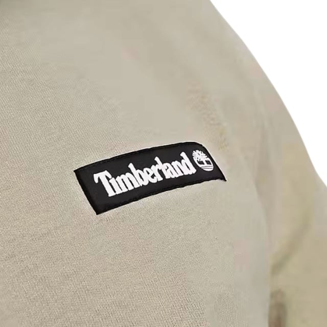 Timberland Men’s T-Shirt
Style Code: TB0A6Q99-269
Style Name : SS  Woven Badge Tee
100% Cotton
Made in Bangladesh
Regular Fit 
Woven Badge Branding on the Chest
Ribbed Neck
Straight Hem
Machine Wash