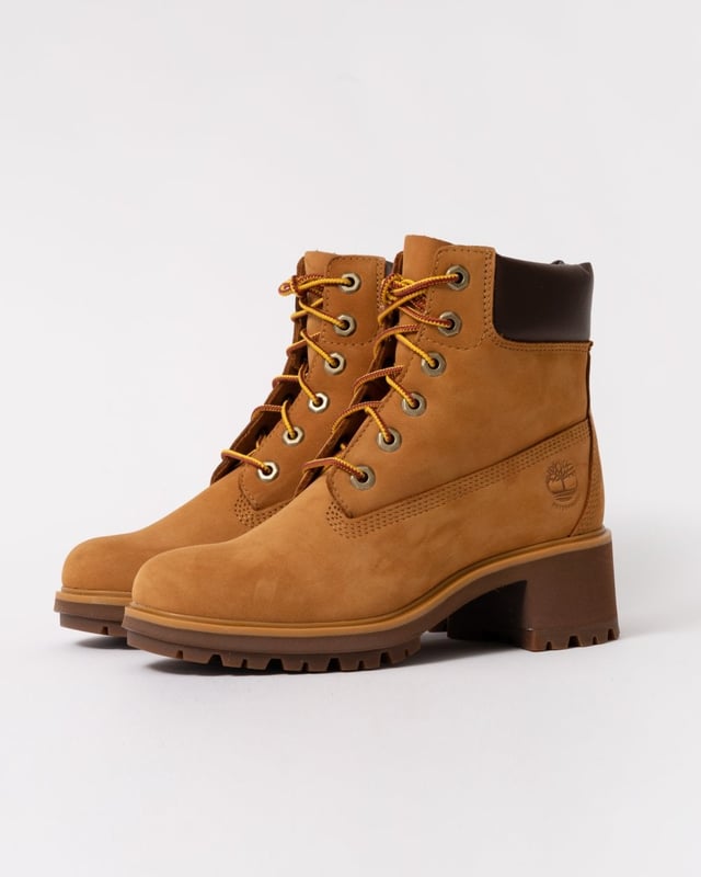 Kinsley features the classic style and durability of Timberland's original boot, but designed with a feminine silhouette. The upper is made with waterproof premium Timberland® leather, and there’s a ReBOTL™ fabric lining containing at least 50% recycled plastic. A seam-sealed construction adds to its waterproof benefits, a rubber lug outsole helps with traction, and an OrthoLite® impressions memory foam footbed helps keep you comfy on any adventure.

Upper made with waterproof premium Timberland® leather
Lace-up style
Padded collar
OrthoLite® Impressions memory foam footbed
Compression-molded EVA midsole
Seam-sealed construction
Rubber lug outsole
We are a member of the Leather Working Group
Heel Height: 2.25" (5.7 cm)
Shaft Height: 5" (12.7 cm)
ReBOTL™ fabric lining containing at least 50% recycled plastic

 