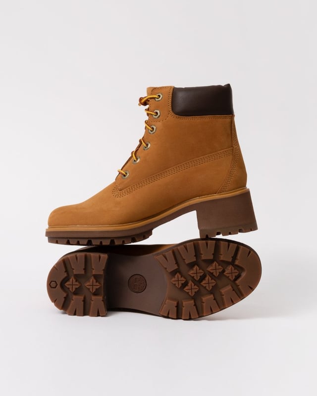 Kinsley features the classic style and durability of Timberland's original boot, but designed with a feminine silhouette. The upper is made with waterproof premium Timberland® leather, and there’s a ReBOTL™ fabric lining containing at least 50% recycled plastic. A seam-sealed construction adds to its waterproof benefits, a rubber lug outsole helps with traction, and an OrthoLite® impressions memory foam footbed helps keep you comfy on any adventure.

Upper made with waterproof premium Timberland® leather
Lace-up style
Padded collar
OrthoLite® Impressions memory foam footbed
Compression-molded EVA midsole
Seam-sealed construction
Rubber lug outsole
We are a member of the Leather Working Group
Heel Height: 2.25" (5.7 cm)
Shaft Height: 5" (12.7 cm)
ReBOTL™ fabric lining containing at least 50% recycled plastic

 