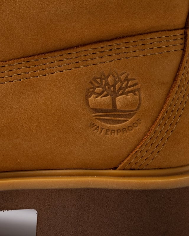 Kinsley features the classic style and durability of Timberland's original boot, but designed with a feminine silhouette. The upper is made with waterproof premium Timberland® leather, and there’s a ReBOTL™ fabric lining containing at least 50% recycled plastic. A seam-sealed construction adds to its waterproof benefits, a rubber lug outsole helps with traction, and an OrthoLite® impressions memory foam footbed helps keep you comfy on any adventure.

Upper made with waterproof premium Timberland® leather
Lace-up style
Padded collar
OrthoLite® Impressions memory foam footbed
Compression-molded EVA midsole
Seam-sealed construction
Rubber lug outsole
We are a member of the Leather Working Group
Heel Height: 2.25" (5.7 cm)
Shaft Height: 5" (12.7 cm)
ReBOTL™ fabric lining containing at least 50% recycled plastic

 
