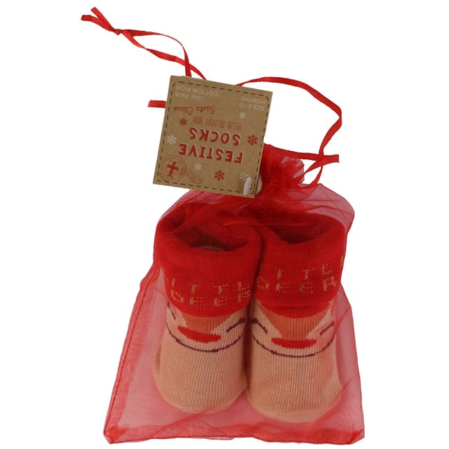 Babies Xmas Socks - First Christmas Delight: Celebrate the magic of your baby's first Christmas with these adorable and cosy baby Xmas socks! Designed to keep your little ones warm and snuggly during the festive season, these socks are both charming and practical. Each pack contains four delightfully festive patterns: Santa Claus, Penguins, Elves, and Xmas Trees, all featuring heartwarming phrases. These playful designs will bring a smile to your face and add holiday cheer to your baby's outfit. Presented in a lovely festive gift bag, these Xmas socks make an ideal gift or stocking filler. They're a thoughtful and delightful holiday treat that will be cherished and remembered. With softness and comfort at the forefront, these baby socks are made from quality materials, including 70% Cotton, 23% Polyester, 5% Elastane, and 2% Metalised Fibres. This gentle combination ensures your baby's feet remain warm and comfortable throughout the season. Plus, keeping them clean and fresh is hassle-free, as they're machine washable!. Available in two size options, 0-6 months and 6-12 months, these baby Xmas socks cater to the tiniest of feet. Make your baby's first Christmas a special and memorable one with these enchanting and cosy socks, designed to warm both their feet and your heart. Essential Product Details: - Made from premium materials for warmth and comfort - Available in two size options: 0-6 and 6-12 months