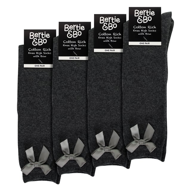Girls Knee-High Socks with Ribbon Bow - Stylish and Comfortable Schoolwear: Elevate your child's school wardrobe with this collection of Girls Knee-High Socks with Ribbon Bow, designed for both style and comfort. Available in classic colors—Black, Navy, White, and Grey—these socks are crafted from soft, durable fabric, perfect for daily wear. The elegant ribbon bow adds a touch of charm, making these socks a standout choice for school uniforms. Extra Product Details:. Soft and Durable Fabric Elegant Ribbon Bow Detail Available in Black, Navy, White, and Grey Comfortable Knee-High Length Machine Washable. These socks are an essential addition to your child's back-to-school wardrobe, combining practicality with a stylish finish.
