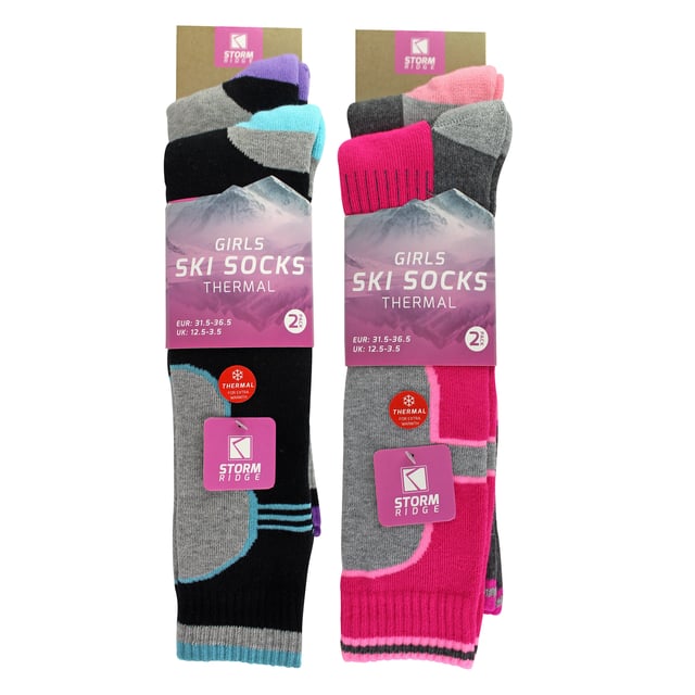 Sock Snob Girls 4 Pack Thermal Ski Socks - Warm, Comfortable, and Ideal for Winter Sports: Keep your little ones warm and comfortable during winter activities with the Girls 4 Pack Thermal Ski Socks. Crafted from a high-quality blend of materials, these socks offer excellent insulation and softness, ensuring that their feet stay cosy even in the chilliest conditions. The thermal design is perfect for skiing, snowboarding, or simply enjoying outdoor play in cold weather. The socks feature a cushioned sole that provides additional comfort, making them suitable for all-day wear. With a snug fit and elasticated arch support, they help to keep the socks in place, preventing slipping and bunching during active use. Available in a variety of fun colours, these thermal ski socks are not only practical but also stylish, adding a pop of colour to winter wardrobes. Parents will appreciate the durability of these socks, designed to withstand the rigours of active outdoor play. Machine washable for easy care, they are a fantastic addition to any child's winter gear. Whether hitting the slopes or enjoying a snow day, these thermal ski socks will keep your child's feet warm and happy. Extra Product Details: High-Quality Thermal Material for Ultimate Warmth Cushioned Sole for Extra Comfort Snug Fit with Elasticated Arch Support Available in Assorted Colours for Style Pack Contains Four Pairs for Versatility