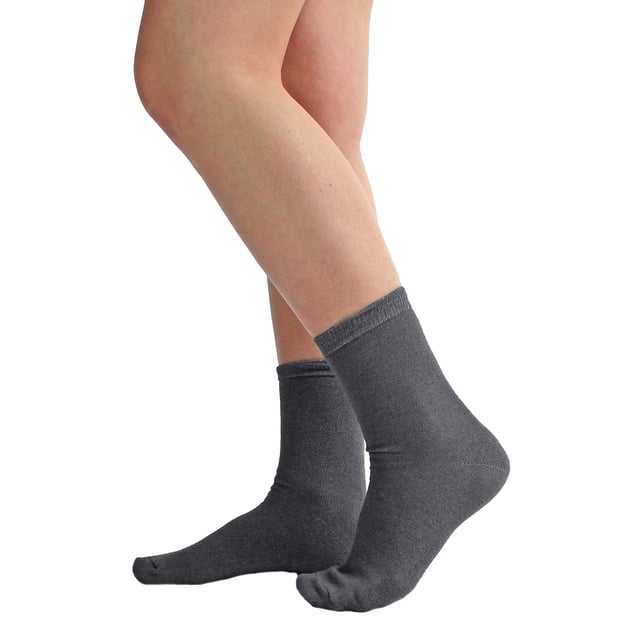 Sock Snob Kids 18 Pair Bulk Value Pack Colourful Cotton Socks: Upgrade your child's sock collection with this incredible bulk value pack of colourful socks. With 18 pairs in over 4 vibrant colours, these socks are a must-have for every child's wardrobe!. Designed with comfort in mind, these cotton socks are incredibly soft and cozy. The 55% cotton content ensures breathability, making them suitable for year-round wear. Whether it's keeping their feet cool in the summer or providing warmth in the winter, these socks have got your child covered. Not only do these socks offer exceptional comfort, but they also provide great value for money. With 18 pairs in a pack, you can easily stock up your little one's sock drawer for the entire year. These reliable socks are perfect for school, sports, and any other activities your child engages in. Choose from 8 vibrant colours and two sizes: 12-3 UK 1-4 US 31-36 EUR and 9-12 UK 10-1 US 27-31 EUR. Made from a blend of 55% Cotton, 25% Polyester, 18% Polyamide, and 2% Elastane, these socks are machine washable for easy care. Extra Product Details: Kids Colourful Socks Available in 4 Vibrant Colours 2 Size Options Soft and Comfortable 18 Pair Bulk Value Pack Unbeatable Value for Money Perfect for School and Casual Wear Machine Washable