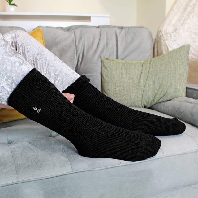 Having cold feet is horrible no matter what your age but with these new Heat Holders from SockShop cold feet should be a distant memory!  With an amazing tog rating of 2.34 these socks have been designed to eliminate the need for wearing as many pairs of socks as possible! These clever socks work by trapping heat and holding it closer to the feet for longer. The extra heavy bulk yarn, long pile cushioning and intense brushing process means these socks are super soft and over 5 times warmer than a typical cotton sock! The knee high length means these socks are perfect for wearing with wellies or winter boots.  Extra thick, extra comfortable and extra warm you really couldn’t want anything else from a thermal sock! Copied by many. Equalled by none.  Extra Product Details  - 2 Sizes available - Many Colours for boys and girls - Suitable for wellies or boots - Thick and warm - 2.3 tog - Brushed Inner - Advanced Insulating Yarn - Long Loop Pile>