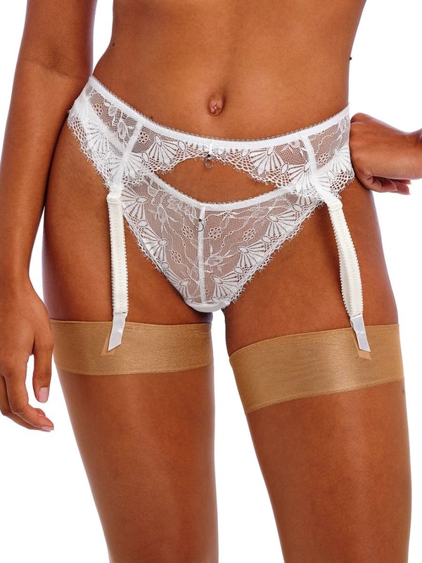 Freya Fascinate Suspender Belt. High rise suspender belt with decorative eyelash edge lace, adjustable suspender straps, hook and eye fastening and metallic ring detailing. Product is hand wash only.