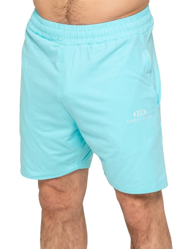 Der Enzo Herren-Gym-Trainingsanzug mit Weste und Shorts wurde für höchsten Komfort und Leistung entwickelt. Die ärmellose Weste mit regulärer Passform bietet einen entspannten, aber sportlichen Look, während das elastische Material mit Lycra-Gewebe Flexibilität und Bewegungsfreiheit gewährleistet. Die passenden Gym-Shorts haben eine reguläre Passform und einen elastischen Bund für einen sicheren und bequemen Sitz. Das markante Enzo Jeans-Branding auf Brust und Oberschenkel verleiht dem Outfit eine stilvolle, sportliche Note.