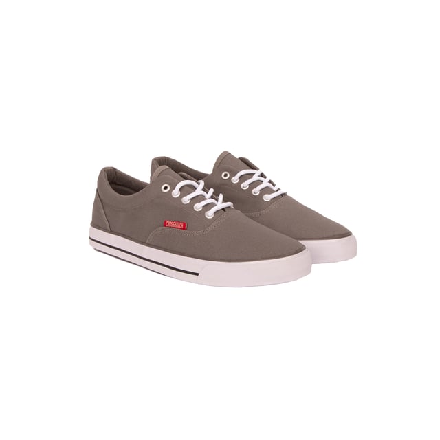 Upper: Canvas. Outsole: Rubber. 5 Eyelets. Padded Ankle, Woven Label. Flat. Cut: Low Cut. Design: Contrast, Logo, Rubber Badge. Toe Style: Round. Fastening: Lace Up.