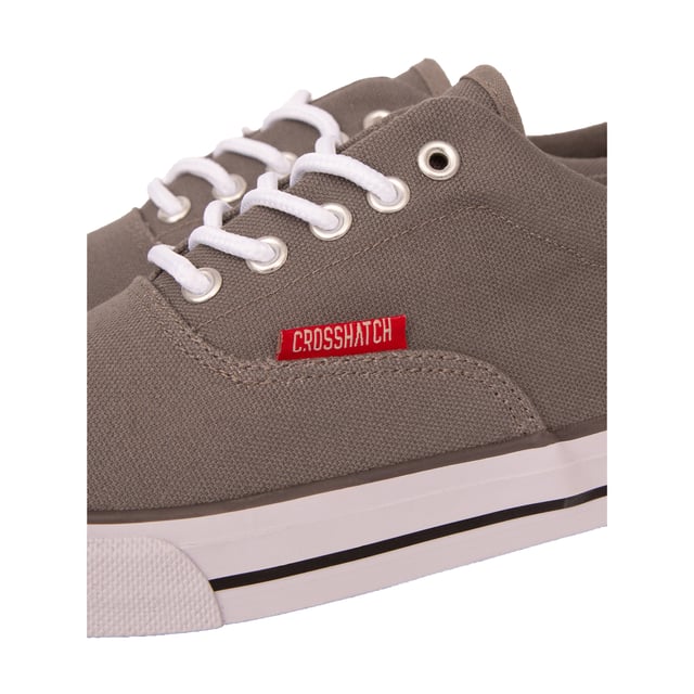 Upper: Canvas. Outsole: Rubber. 5 Eyelets. Padded Ankle, Woven Label. Flat. Cut: Low Cut. Design: Contrast, Logo, Rubber Badge. Toe Style: Round. Fastening: Lace Up.