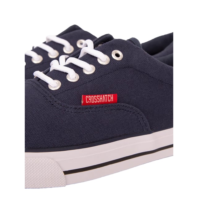 Upper: Canvas. Outsole: Rubber. 5 Eyelets. Padded Ankle, Woven Label. Flat. Cut: Low Cut. Design: Contrast, Logo, Rubber Badge. Toe Style: Round. Fastening: Lace Up.