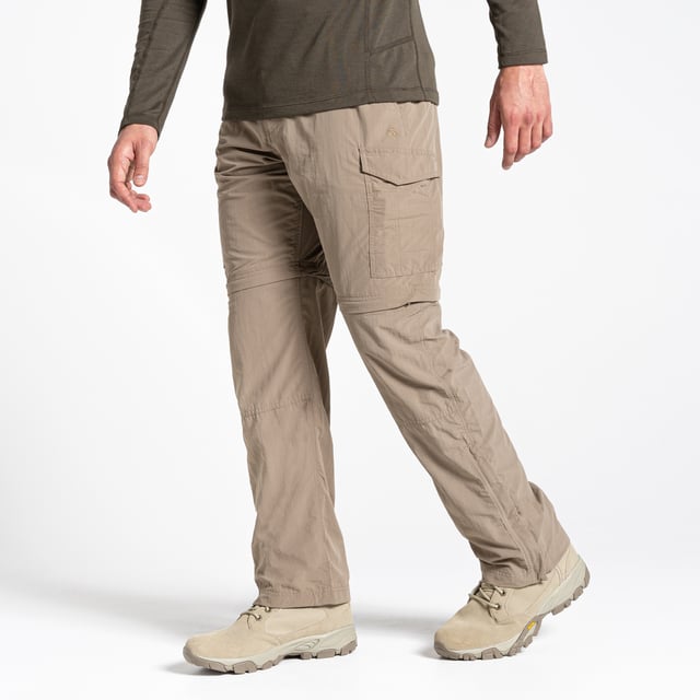 Convertible travel trousers from Craghoppers. NosiLife Convertible II trousers make the perfect travel companions, featuring durable anti-insect treatment to help protect skin from bug bites. They also offer the option of toggling between long and short versions, thanks to the zip-off legs. A versatile choice for hot-climate adventures.